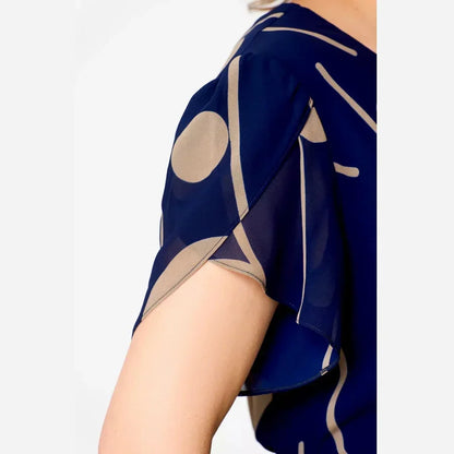 Maggie | Effortlessly tailored navy polka dot chiffon midi dress