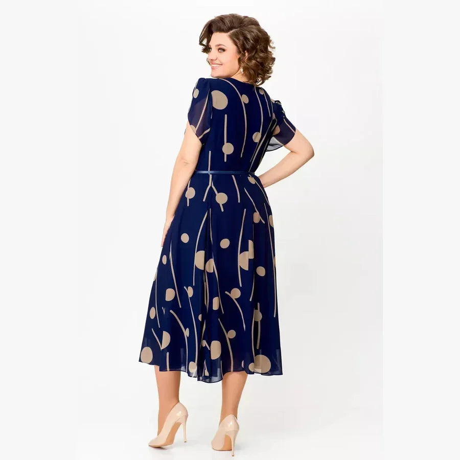 Maggie | Effortlessly tailored navy polka dot chiffon midi dress