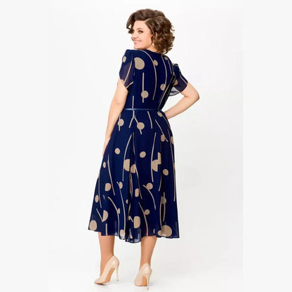 Maggie | Effortlessly tailored navy polka dot chiffon midi dress